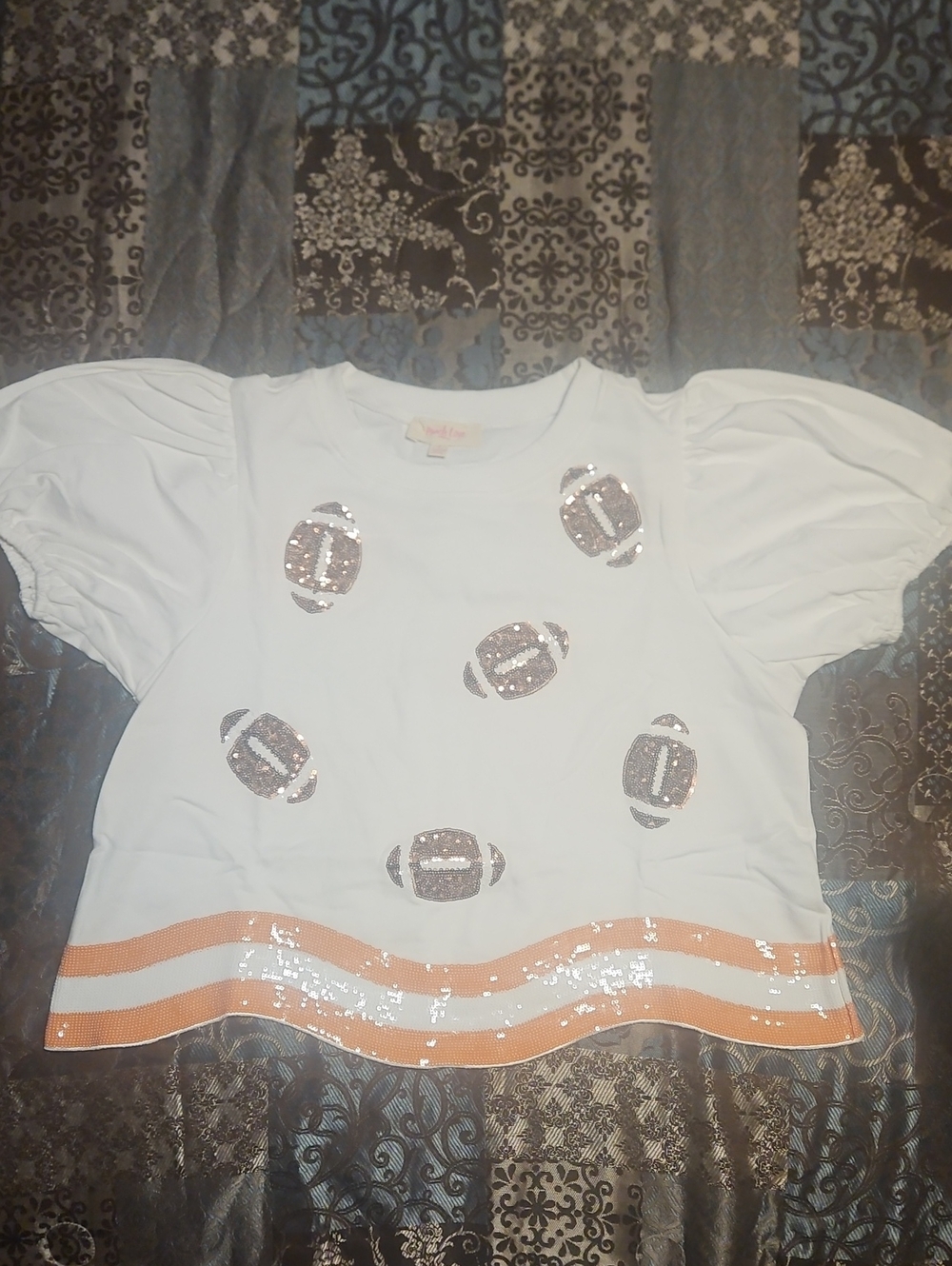Peach Love California White Tee with Sequin Footballs and Orange Hem
